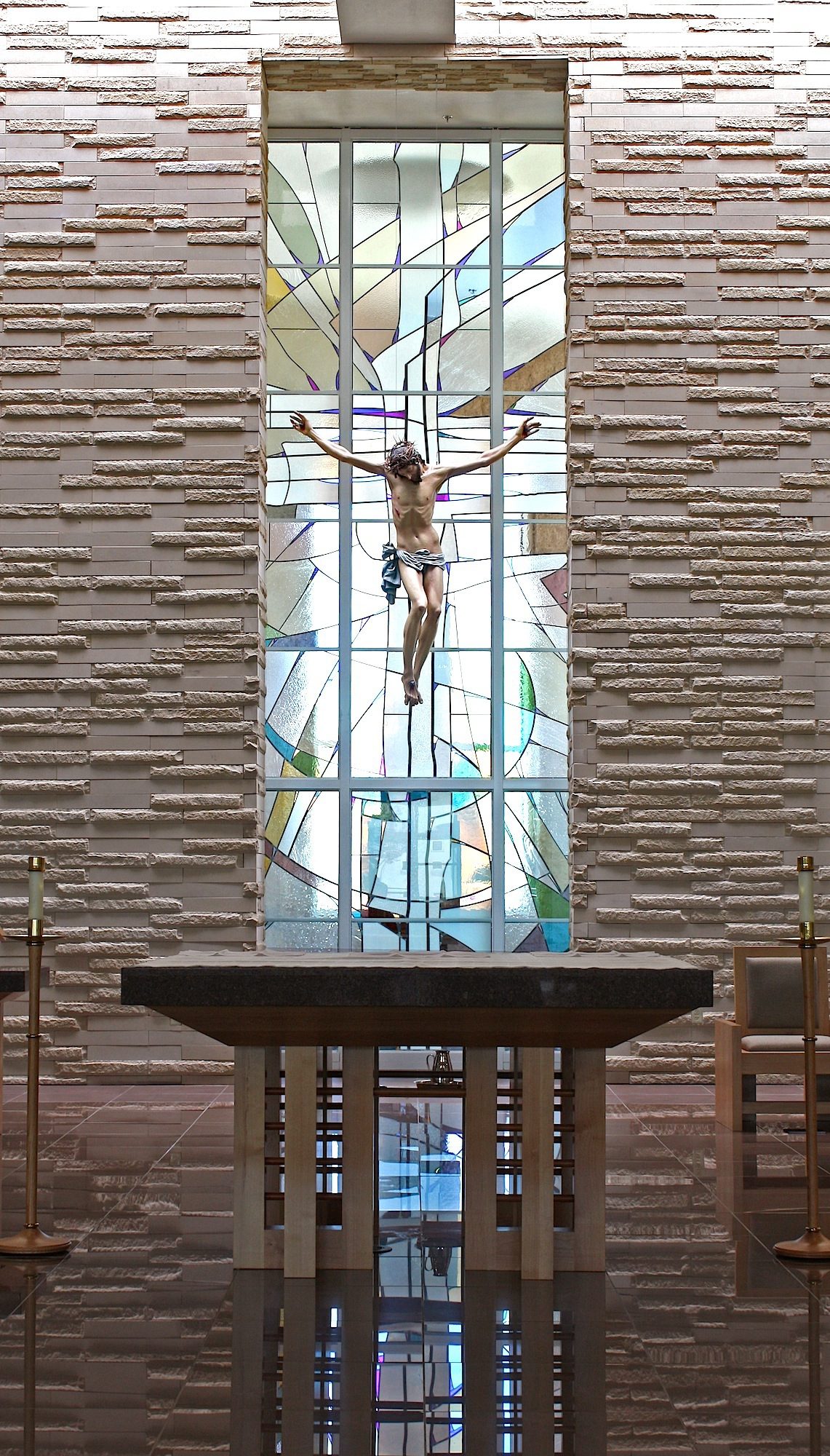 stained glass cross and corpus