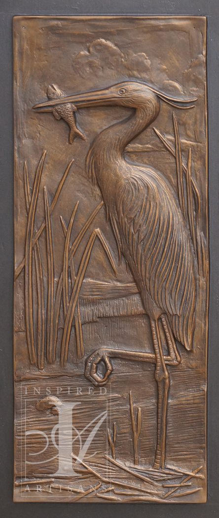 Bronze plaque of a heron